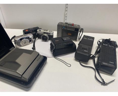 A selection of assorted vintage camera's including a CB Radio (untested) 