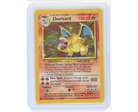 Pokemon TCG. 4th Print Base Set Charizard. This is one of the rarer base set prints to find and can be easily distinguished f
