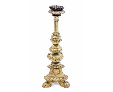 A gilt gesso Spanish style pricket stick, tricorn body with paw feet, approx 55cms high