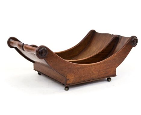 A George III mahogany cheese trough, circa 1815, on brass caster feet, twin section boat form, approx 43cms wide