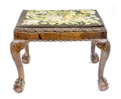 A George II style walnut stool, with shell carved cabroile legs and ball and claw feet: drop in tapestry seat, approx 48cms h