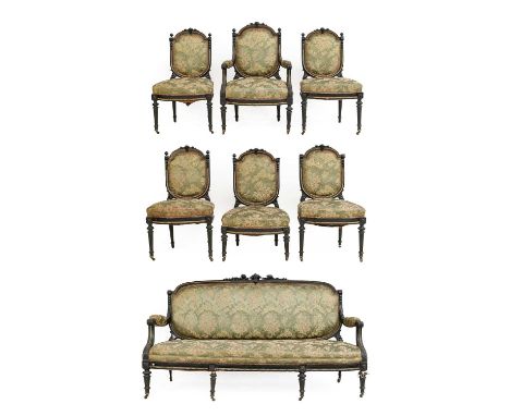A Late Victorian Ebonised and Gilt Metal-Mounted Seven Piece Salon Suite, circa 1880, recovered in floral green cut damask, c