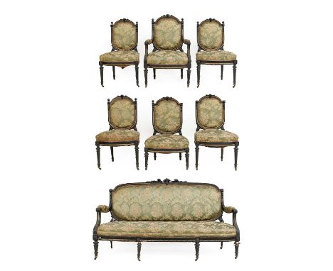 A Late Victorian Ebonised and Gilt Metal-Mounted Seven Piece Salon Suite, circa 1880, recovered in floral green cut damask, c