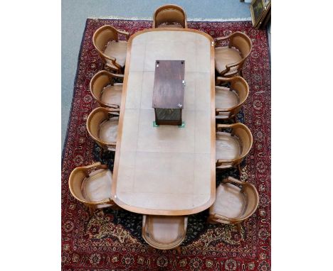 A Walnut Leather Inset Boardroom Table, 1st half 20th century, raised on broad reeded square tapering supports, 300cm by 137c