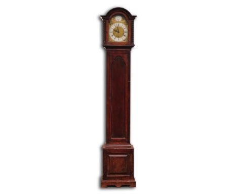 AN OAK CASED QUARTER STRIKING 'GRANDMOTHER' CLOCKThe arched top flanked by turned columns, with 7 1/2 in arched brass dial, c