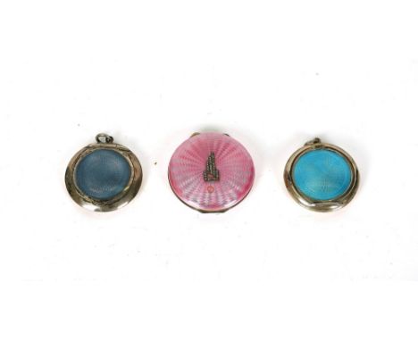 THREE SILVER AND ENAMEL LADIES POWDER COMPACTS (3)A silver mounted pink enamel ladies powder compact the cover with a marcasi