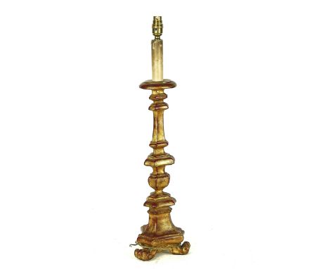AN ITALIAN 18TH CENTURY STYLE GILT COMPOSITION ALTAR TABLE LAMP20th Century51cm high, excluding light fitmentProvenance: Hyld