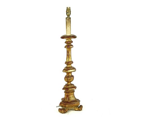 AN ITALIAN 18TH CENTURY STYLE GILT COMPOSITION ALTAR TABLE LAMP20th Century51cm high, excluding light fitmentProvenance: Hyld