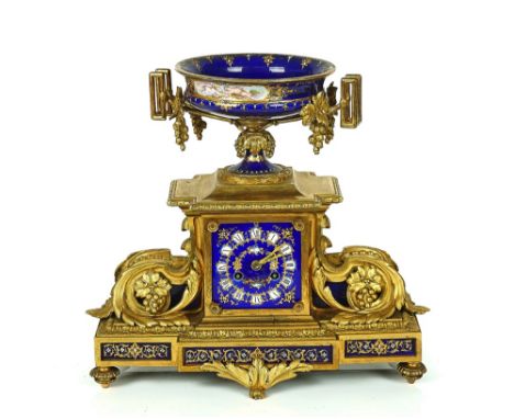 A FRENCH ORMOLU AND SEVRES-STYLE MANTEL CLOCKCirca 1880Surmounted by a twin-handled urn painted with cherubs, the twin train 