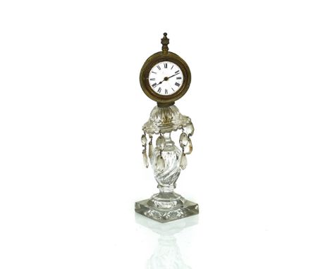 A BRASS SEDAN CLOCK LATER MOUNTED ON A CUT-GLASS CANDLESTICKFitted with a watch movement by John Manley, Bury St Edmunds, 29c