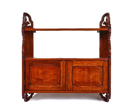 A LATE VICTORIAN WALNUT HANGING SHELF/CUPBOARD60cm wide; 65cm highProvenance: Hylda and Lewis Gilbert, Sheldrake Place, Londo