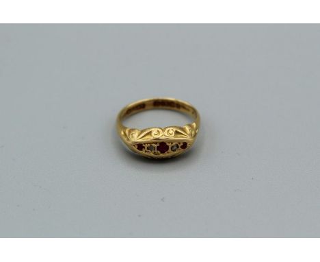 An 18ct gold , ruby and eight cut diamond scroll ring, 1918 Birmingham, size L, gross weight approx 3.1gm