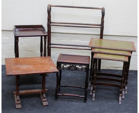 A nesting set of three reproduction occasional tables, a Chinese hardwood lamp table with pierced frieze, a reproduction two 