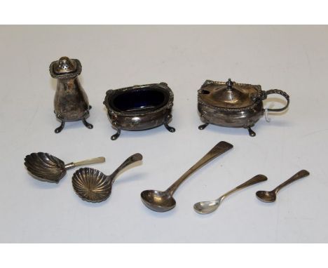 A number of sterling silver tableware and flatware to include two scallop shaped George III tea caddy spoons (8)&nbsp;