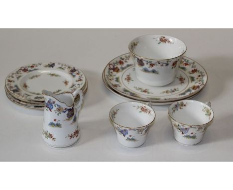 An early 20th century Royal Worcester tea service, comprising twelve tea cups, eleven saucers, sugar, cream, twelve tea plate
