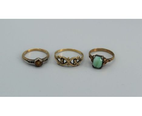 Three rings featuring a 9ct scroll ring (approx 1.6gm, size R ) plus two [paste set rings stamped 9ct and silver, gross appro