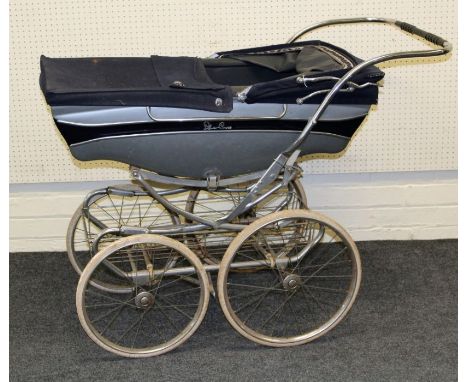 A Vintage Silvercross full sized pram raised on four wheels, w117cm