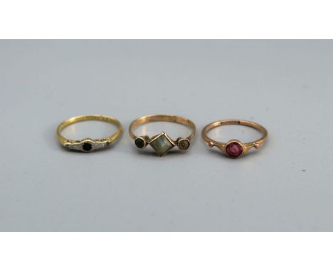 Three early 20th century rings, 1 stamped 18ct and plat set with a small sapphire and single cut diamonds, size K 1/2, gross 