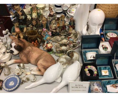 Group of figure and animal ormanets, two Wedgwood Jasper ware pin dishes, Royal Worcester trinket boxes, other decorative cer