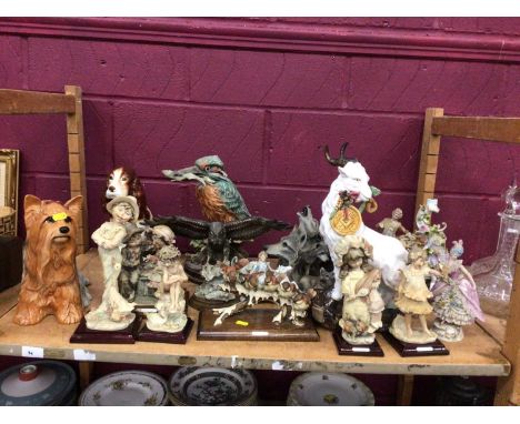 Large collection of ceramic and resin figurines, including Beswick and others (one shelf)