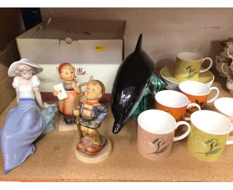 Susie Cooper six place coffee set, Nao figure (boxed), two West Germany figures and Poole pottery dolphin