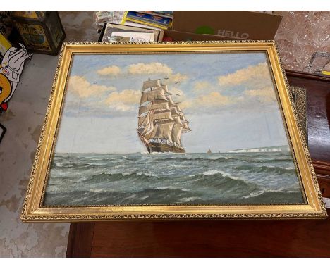 Oil on canvas of a sailing ship at sea in gilt frame, together with a print of another ship. (2)