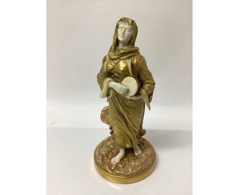 An early 20th century Royal Worcester figure of a musician, modelled in gilt as a lady with a drum, signed Hadley with puce m