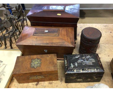 Five tea caddies, including one Victorian rosewood and mother of pearl rosewood sarcophagus form, one similar in mahogany, a 