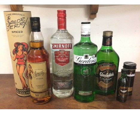 Five bottles of spirits to include Sailor Jerry spiced rum 70cl, Smirnoff vodka 1litre, Gordon's gin 70cl, Glenfiddich scotch