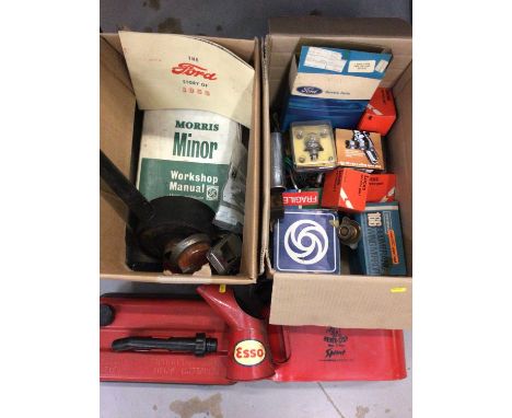 Three boxes of vintage car related items including Esso oil can, 1953 Ford booklet, Morris Minor workshop manuals, boxed part