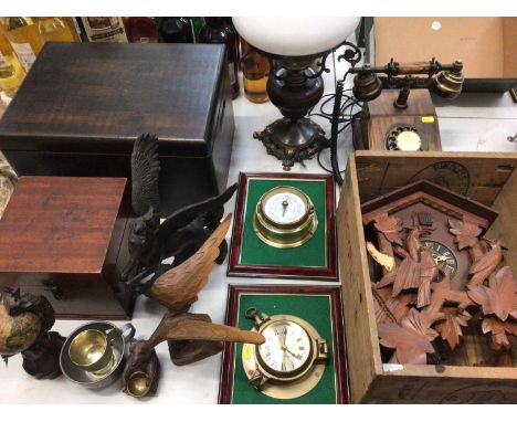 Two wooden work boxes, wooden crates, cuckoo clock, desk globe, electric oil lamp, ornaments, vintage style telephone and oth