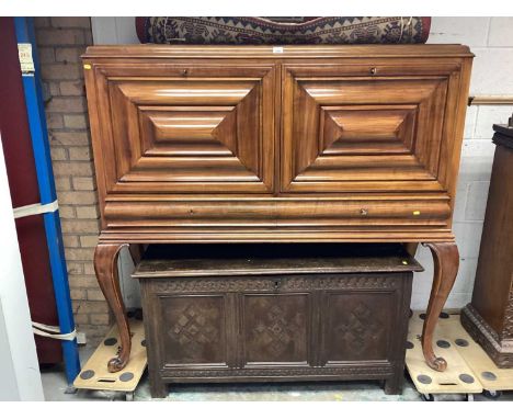 1930's Dutch walnut cabinet with two panelled fall front doors enclosing shelf to one side and marble lined interior to the o