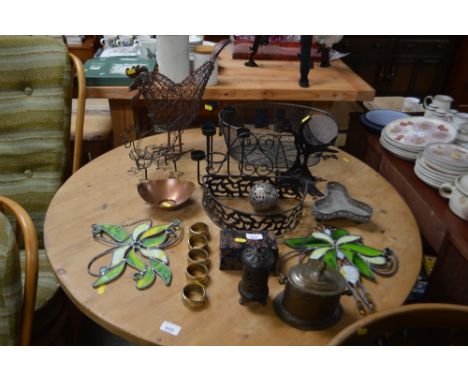 A cased set of musical balls; brass napkin rings; candle light holders etc