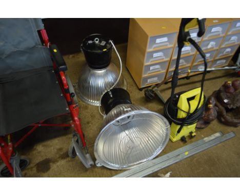 Two large industrial light fittings