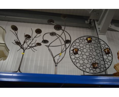 Three decorative tea light holders
