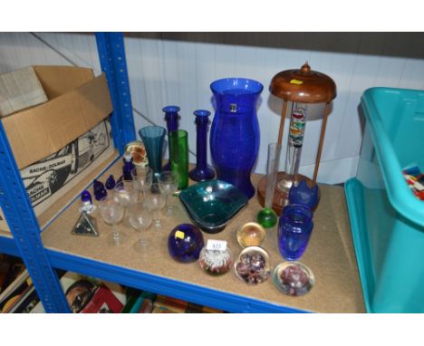 A quantity of various glassware to include a thermometer; various paperweights; art glass bowl