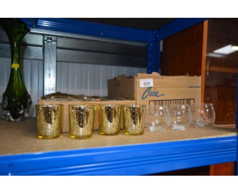 Two boxes of tea light holders