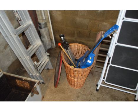 A wicker basket and contents of various childrens toys, mincer, tripod etc.