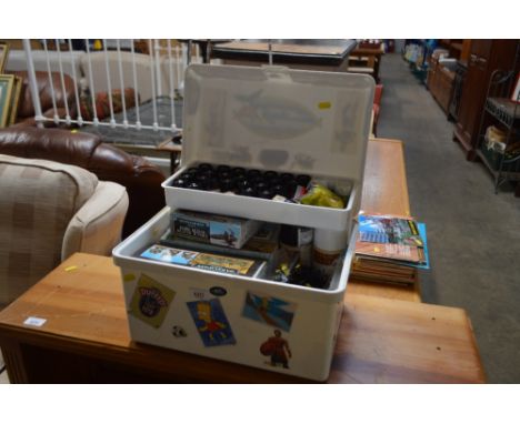 A box containing various war hammer figures and paints