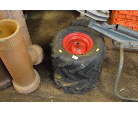 Two lawn tractor spare tyres