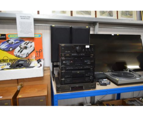 A Technics stack to include compact disc player, stereo tuner, double cassette deck, integrated amplifier and one other compa