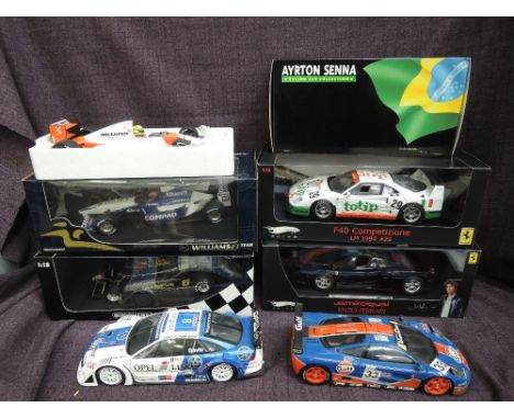 Five 1:18 scale diecast racing and sports cars, Minichamps Williams, Mclaren and Lotus, Elite F40 Competizione and Jamiroquai