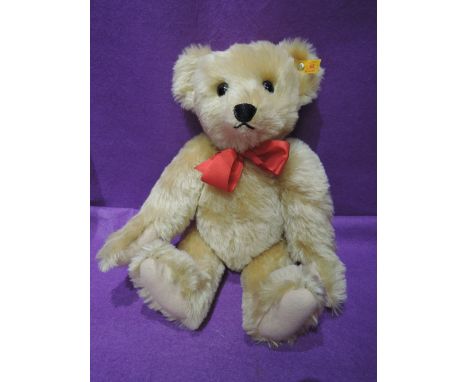 A Steiff replica 1909 jointed bear having growling mechanism, yellow tag in ear, height 17 inches