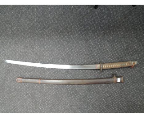 A Japanese Katana sword, blade length approx 27.6in/70cm, fish skin grip with leather binding, metal scabbard, in good condit