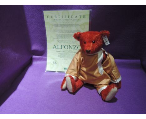 A modern steiff bear, 1908 Replica Alfonzo, having jointed body and growling mechanism, white tag and gold button in ear, lim
