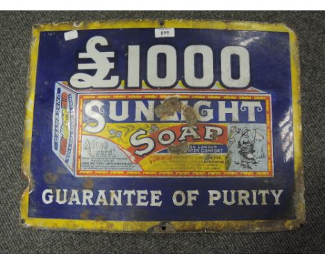 An enamel advertising sign for Sunlight soap £1000 guarantee of purity 