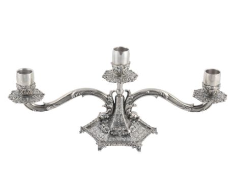  An Italian silver coloured low two branch three light candelabrum by Ditta A. Henin, Milan 1944-68 .800, the acorn capitals 