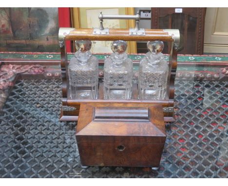 OAK THREE DECANTER TANTALUS (AT FAULT) AND ROSEWOOD SECTIONAL TEA CADDY