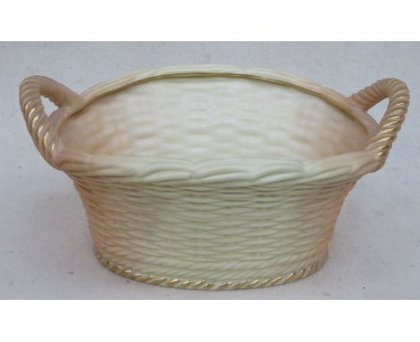 ROYAL WORCESTER BLUSH IVORY GILDED AND GLAZED CERAMIC TWO HANDLED BASKET, No 2365, DATED 1905, APPROXIMATELY 24cm x 19cm 