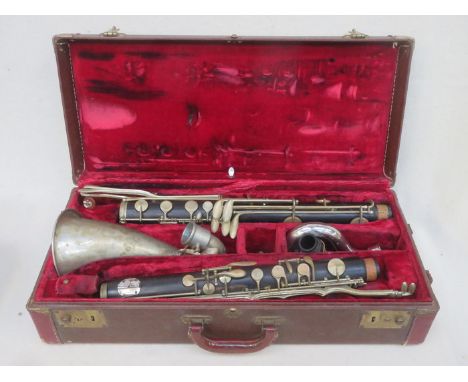 CASED VICTORIAN EBONY AND SILVER COLOURED SECTIONAL BASS CLARINET BY DUPRE, FRANCE 